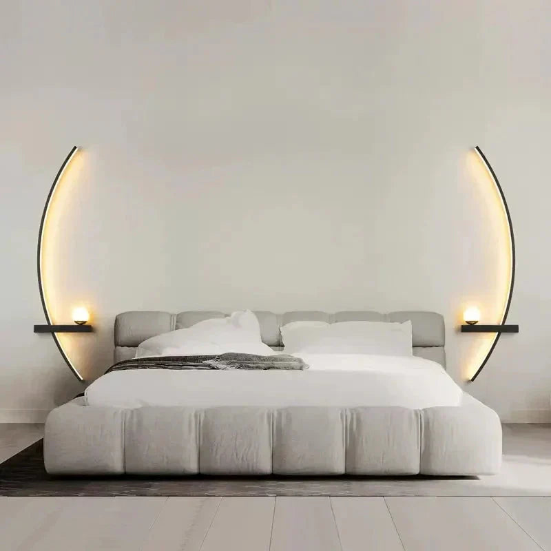 Modern bedroom with a bed and wall-mounted lights