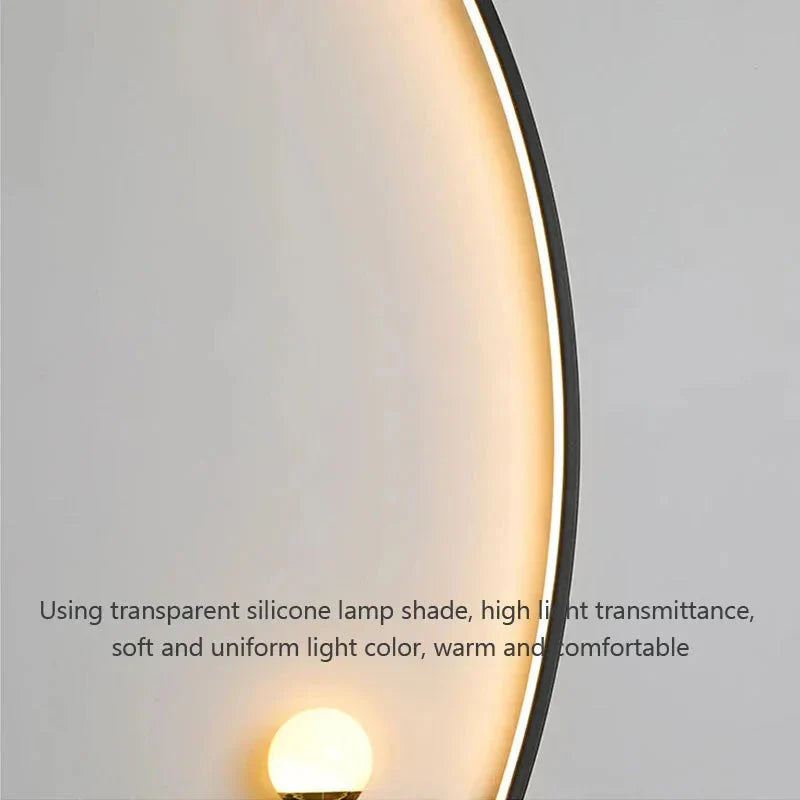 Light fixture with transparent silicone lamp shade on a gray background